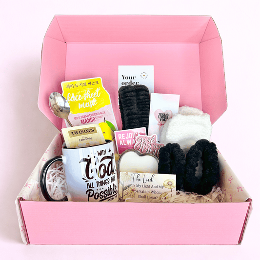 A big christian faith based gift box filled with self care and beauty items for woman